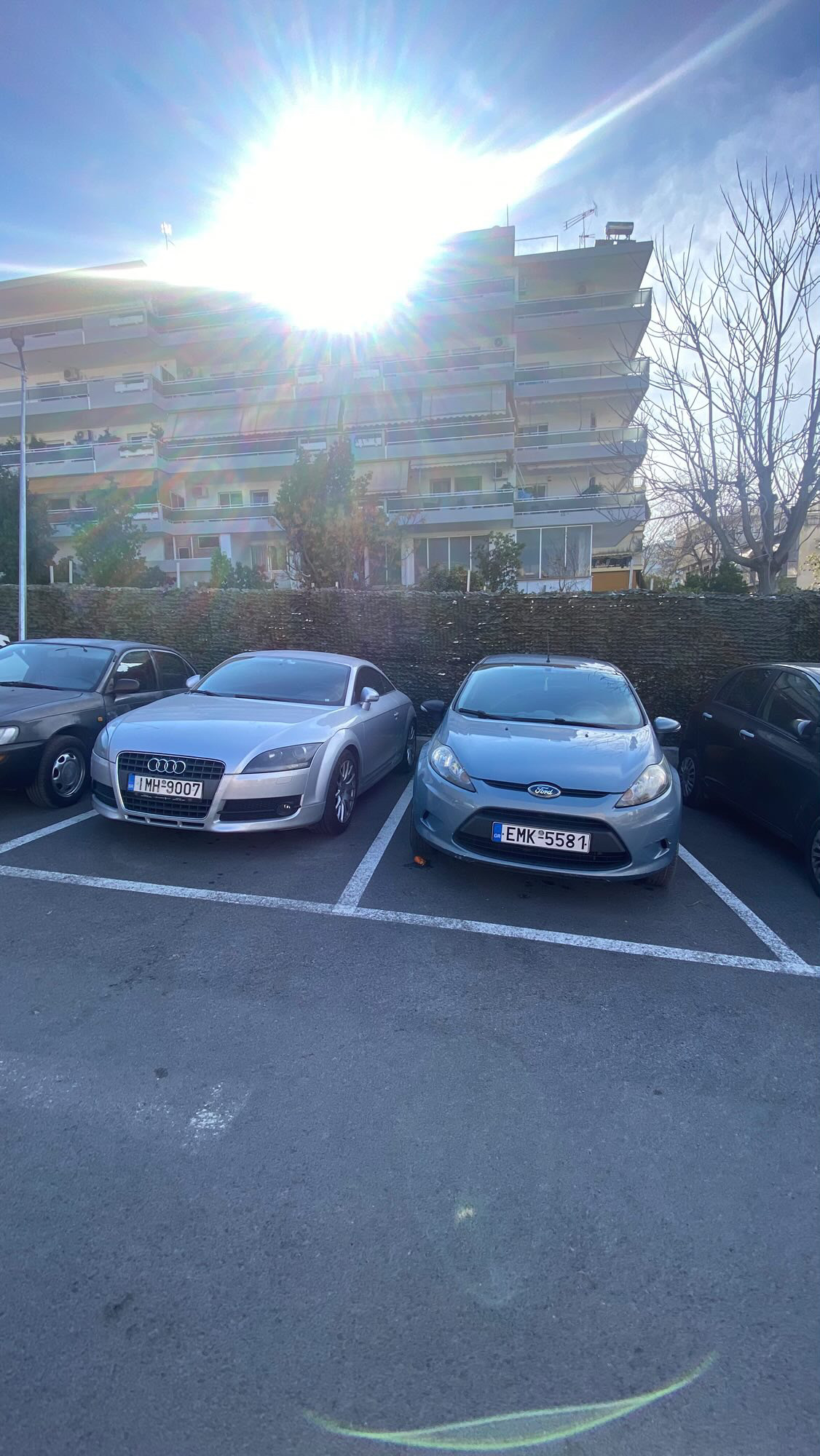 The Fiesta parked next to an Audi TT
